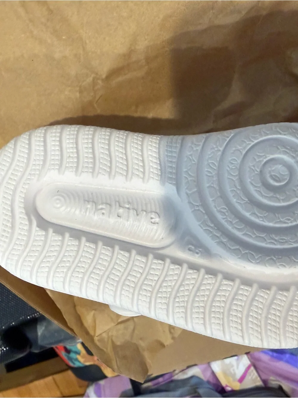 Native toddler sandals in Shell White